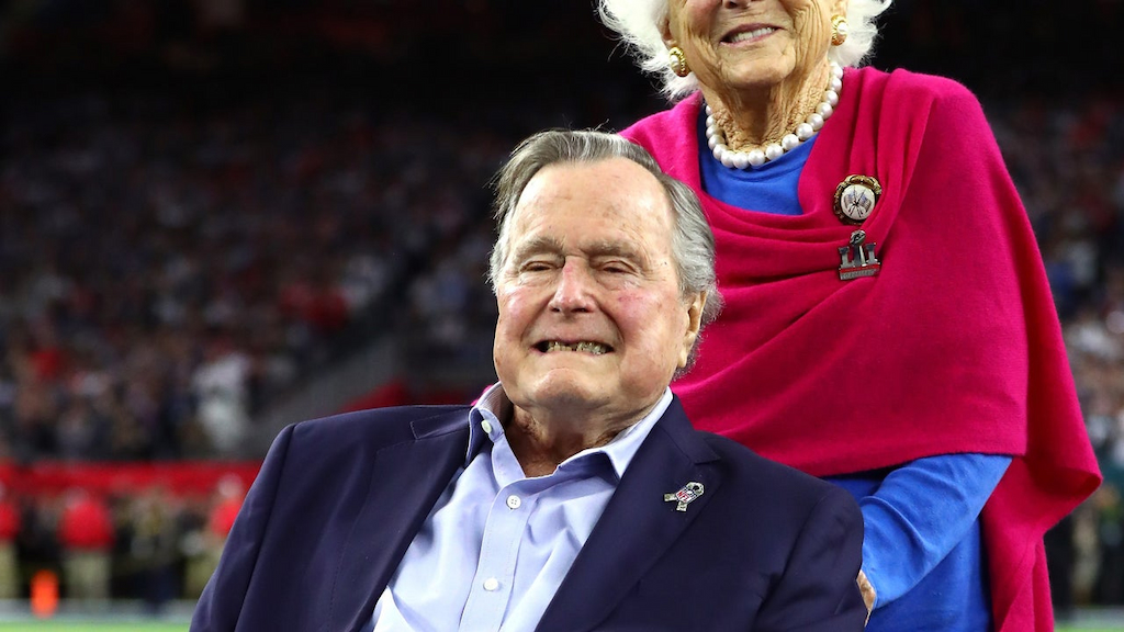President George H.W. Bush and Barbara Bush arrive for the coin toss prior to Super Bowl 51 between the Atlanta Falcons and the New England Patriots at NRG Stadium on February 5, 2017 in Houston, Texas.