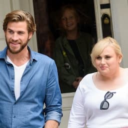 NEWS: Rebel Wilson and Liam Hemsworth Kiss on the Set of 'Isn't It Romantic' -- See the Pic!