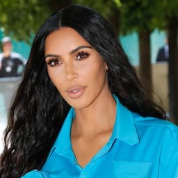 Kim Kardashian Shares Photo of Herself Trying on Jewelry After Returning to Paris