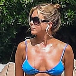 Jennifer Aniston Looks Super Fit in Blue Bikini While Lounging Poolside in Italy