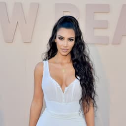 Kim Kardashian Wears Stylish Swimsuit While Doing Beach Yoga -- Pic