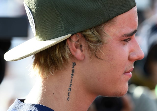 Satisfying Justin Bieber Neck Tattoo