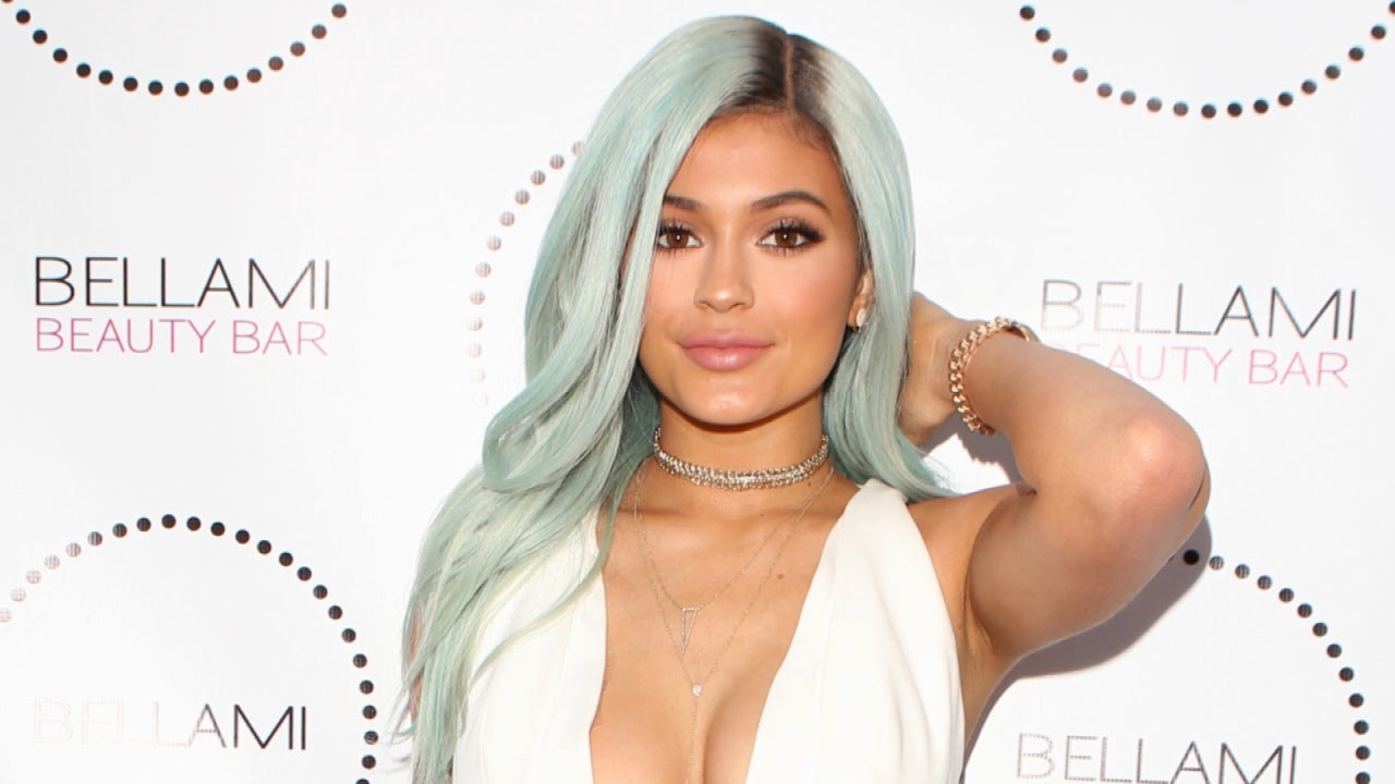 Kylie Jenner Debuts New Ice Blue Hair In A Plunging White Jumpsuit