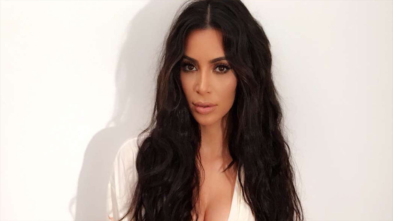 Kim Kardashian Wears Insanely Long Wig, Shows Off Curves at New
