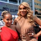 Recording artists Adrienne Bailon (L) and Tamar Braxton attend the P&G Red Carpet Style Stage at the 2013 BET Awards at Nokia Theatre L.A. Live on June 30, 2013 in Los Angeles, California.