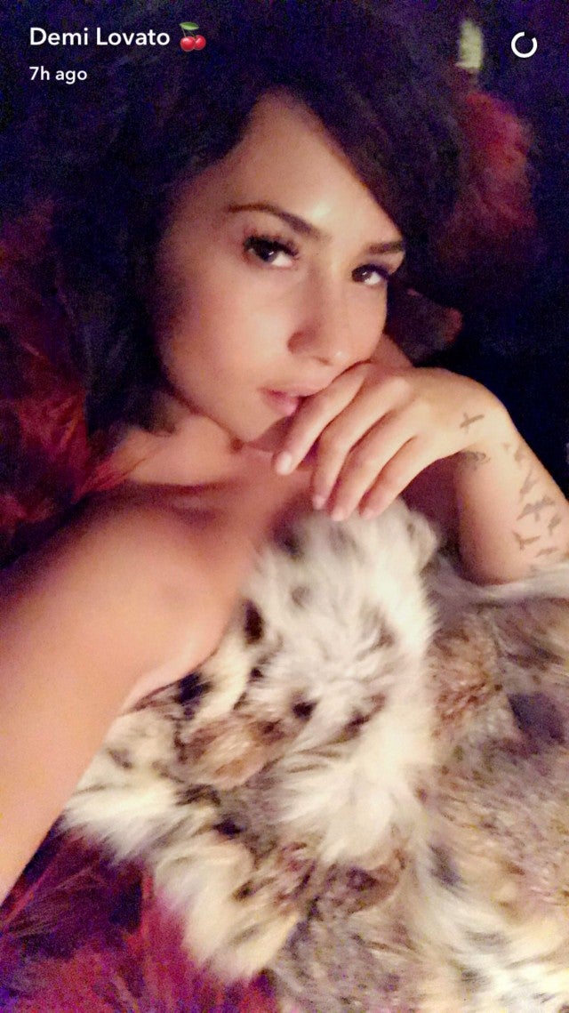 Demi Lovato Takes a Topless Nap on a Bed of Furs During Her Wardrobe
