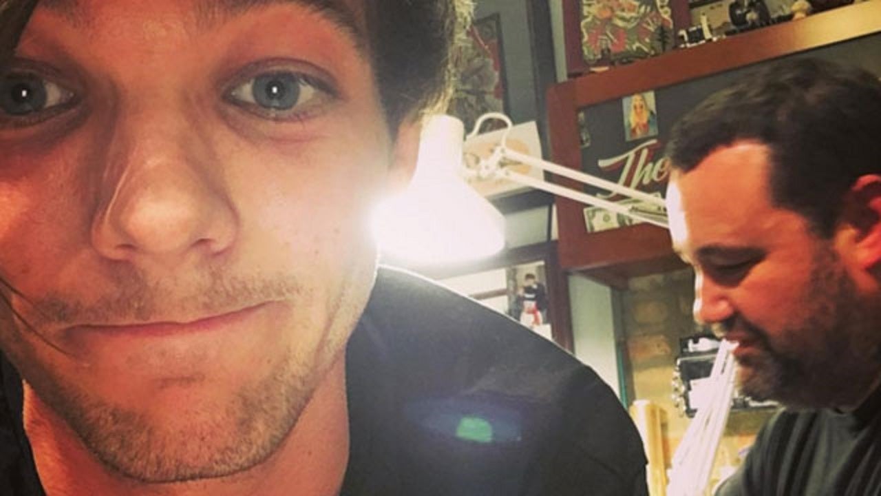 Louis Tomlinson Got a New Birthday Tattoo -- and It Might Be on His Butt! | Entertainment Tonight