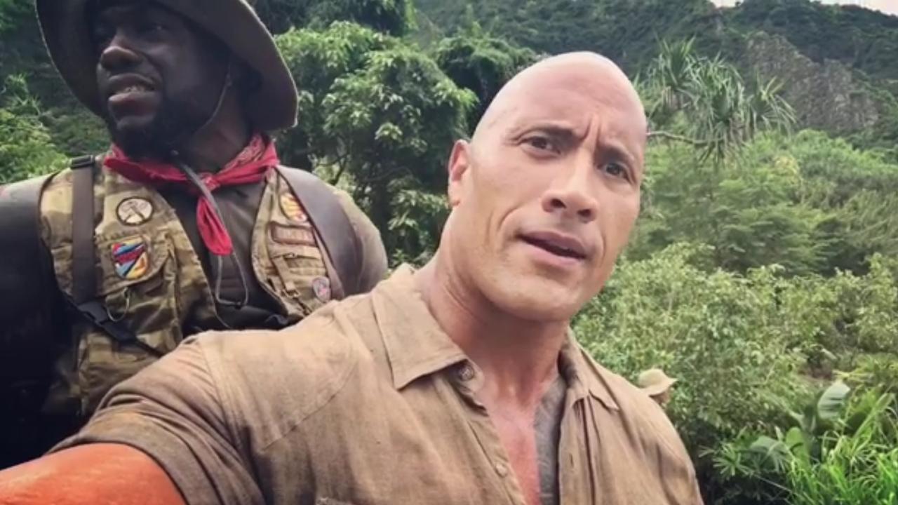 Dwayne Johnson and Kevin Hart Get Uncomfortably Close While Filming