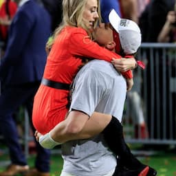 Patrick Mahomes and Wife Kiss on Sidelines of Chiefs vs. Eagles Game