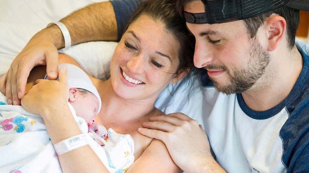 Jade Roper and Tanner Tolbert with their new baby