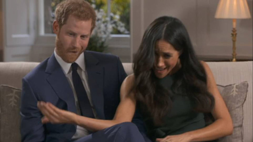 Prince Harry and Meghan Markle goof off during engagement interview.