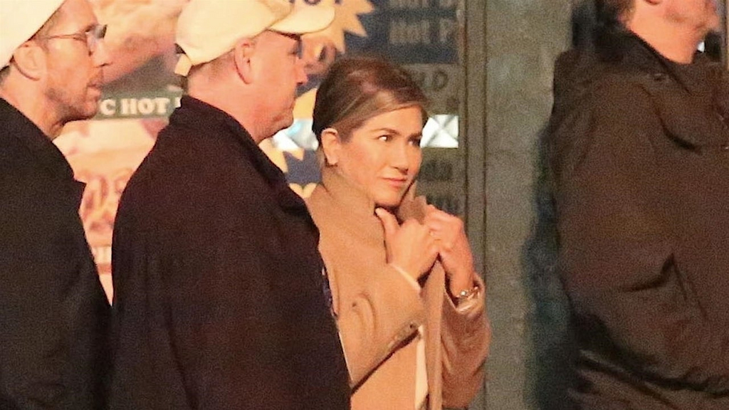 Actress Jennifer Aniston and director Mark Duplass film scenes for 'The Morning Show' on location in Los Angeles. Other cast members could also be seen roaming the set including Ian Gomez. 