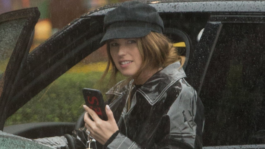 Katherine Schwarzenegger spotted out in the rain wearing new engagement ring.