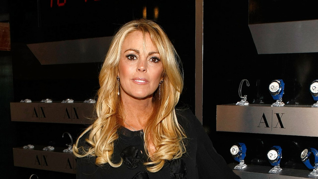  Dina Lohan arrives at the launch of A/X Watches at the SLS Hotel on April 15, 2009 in Los Angeles, California.