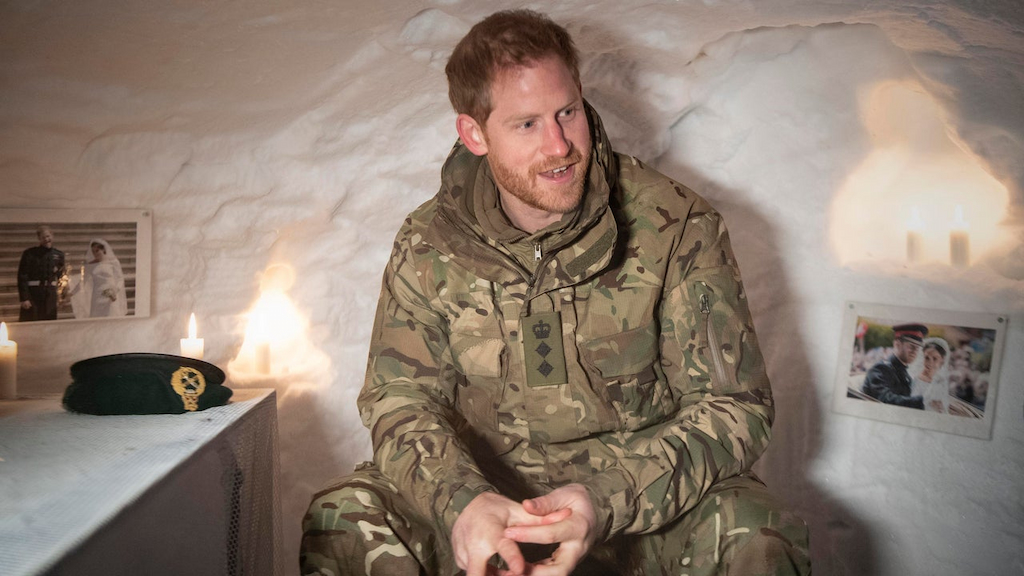 Prince Harry in a Quincey Shelter, a makeshift shelter built of snow, during a visit to Exercise Clockwork in Bardufoss, Norway.