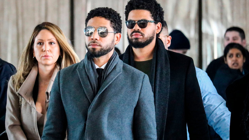 Jussie Smollett and team arrive for a court hearing at the Leighton Criminal Courthouse on March 12, 2019 in Chicago. 