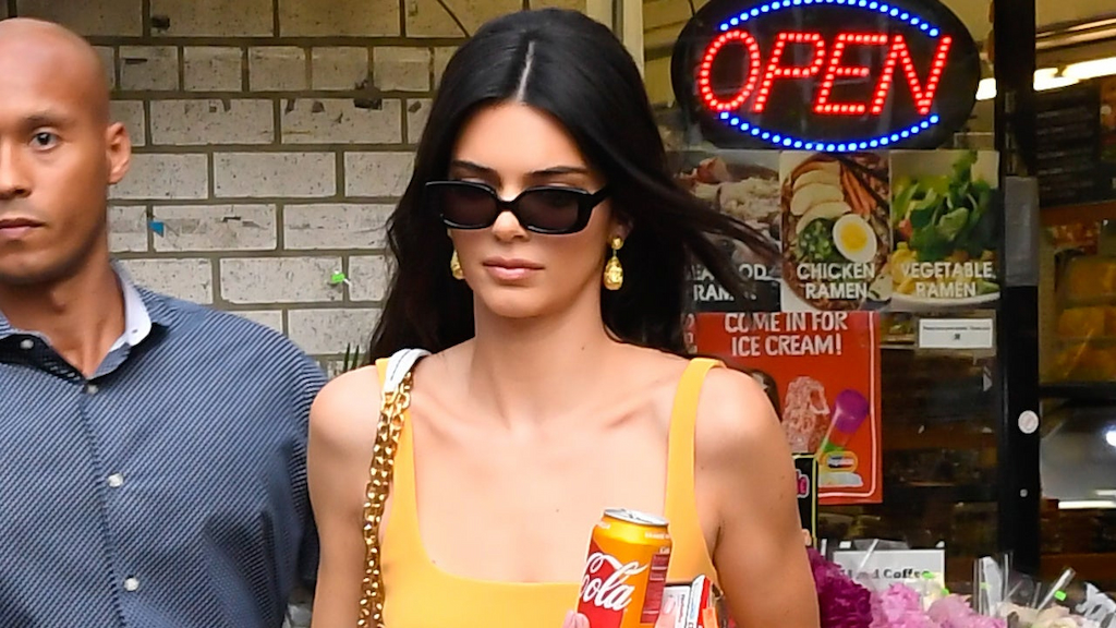Kendall Jenner in orange dress and coke can 1280