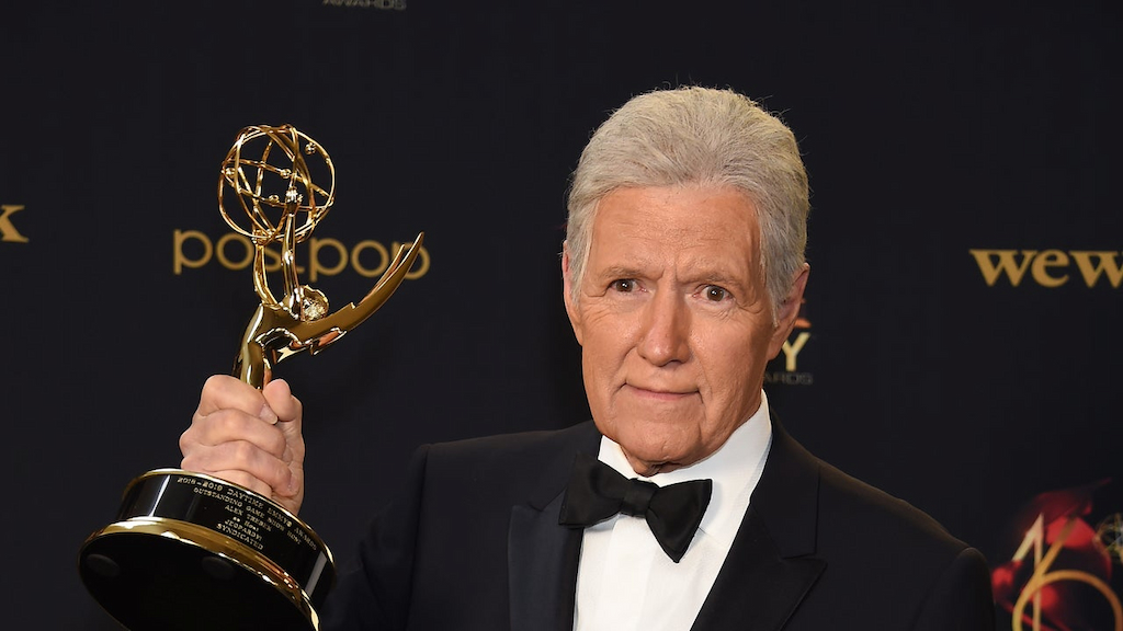 Alex Trebek poses with the Daytime Emmy Award for Outstanding Game Show Host in the press room during the 46th annual Daytime Emmy Awards 