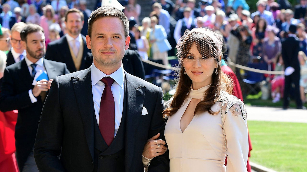 Patrick J. Adams and Troian Bellisario at St George's Chapel at Windsor Castle before the wedding of Prince Harry to Meghan Markle 