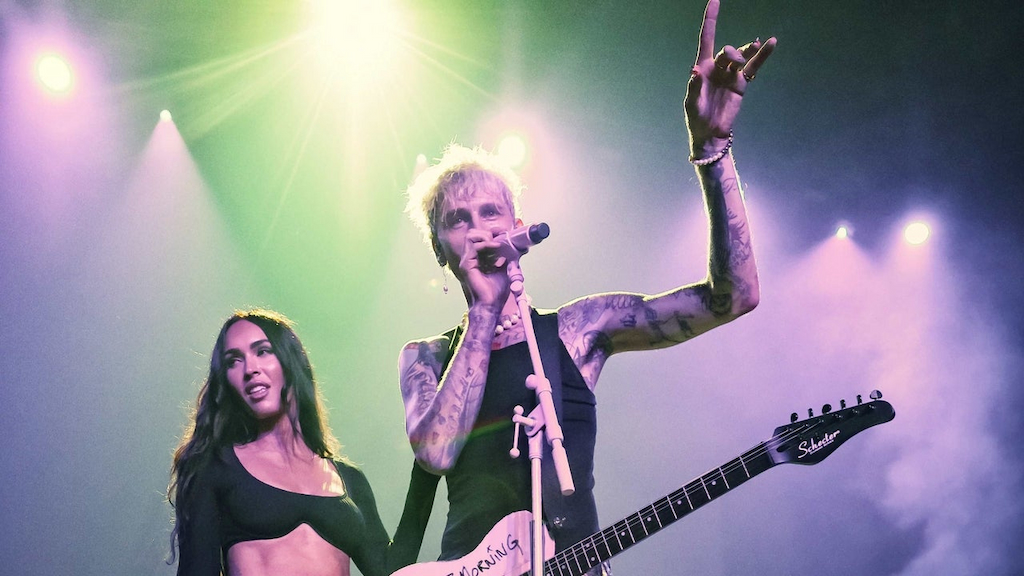 : Megan Fox and Machine Gun Kelly are seen during the Barstool 500 party at Grand Park on May 28, 2021 in Westfield, Indiana.