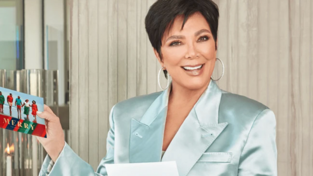 Kris Jenner holding holiday card