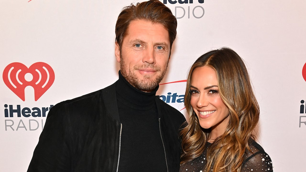 Allan Russell and Jana Kramer attend iHeartRadio Power 96.1's Jingle Ball 2023 at State Farm Arena on December 14, 2023 in Atlanta, Georgia.