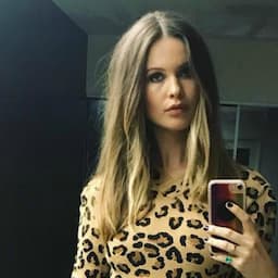 Behati Prinsloo Flaunts Baby Bump in Sexy Leopard Print Dress