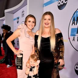 Kelly Clarkson Walks AMAs Red Carpet With Her Daughters, Teases 'Powerful' Performance With Pink (Exclusive)