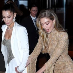 MORE: Model Gigi Hadid Nearly Trips Over Her Nude Gown, Holds Onto Sister Bella to Keep From Falling