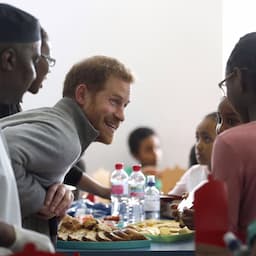 NEWS: Prince Harry Adorably Beams While Serving Food to School Children in London: Pics!