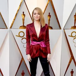 Emma Stone Elegantly Rocks Silk Tuxedo at 2018 Oscars