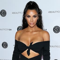 Kim Kardashian Steps Out in Low-Cut Look With Her 'Perfume Tester' North West
