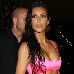 Kim Kardashian Lives Her Best Boat Life in Body-Hugging Neon Pink Outfit