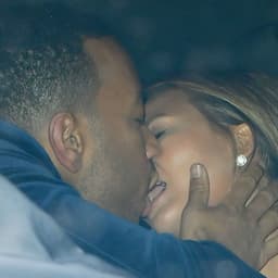 Chrissy Teigen Shares a Passionate Kiss With John Legend After 'GQ Man of the Year' Awards
