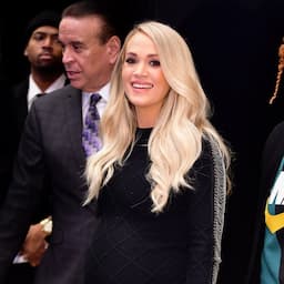 Carrie Underwood Styles Her Baby Bump in Chic Curve-Hugging Black Dress