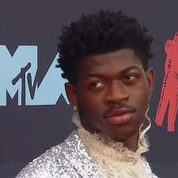 Lil Nas X Shines in Silver Sequins on 2019 MTV VMAs Red Carpet