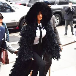 Cardi B Wears Feather Coat With 15-Foot Train to Court Appearance  