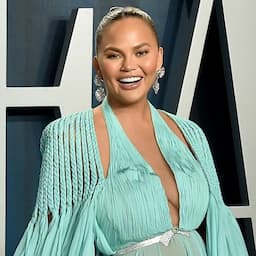 Chrissy Teigen Poses Topless After Having Her Breast Implants Removed