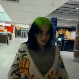Watch Billie Eilish Run Around an Empty Mall in New Music Video