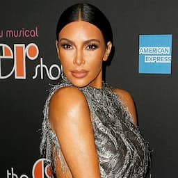 Kim Kardashian Poses With Her Sisters' Boyfriends in Candid Snap