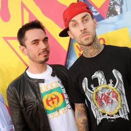 Travis Barker Honors Late DJ AM as He Jets to Italy With Kourtney