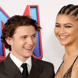 Zendaya Stops Tom Holland in His Tracks at 'Spider-Man' Premiere