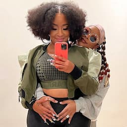 Da Brat and Fiancé Jesseca Dupart Snuggle Up in Pics to Announce They're 'Extending the Family'
