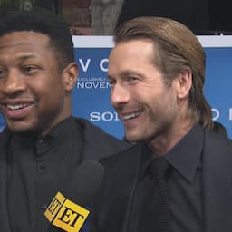 Glen Powell Recalls Pitching ‘Devotion’ to Jonathan Majors in a Bath House (Exclusive)