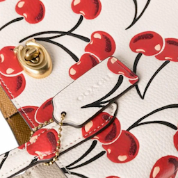 Coach's Cherry Print Handbag Collection Is Ripe for Spring and 70% Off Right Now