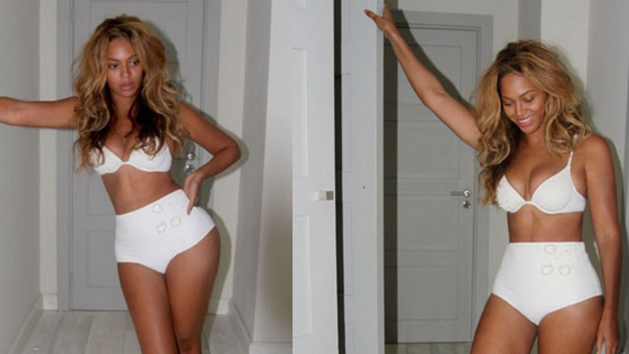 Beyonce's looking good in this white bikini but different from her...