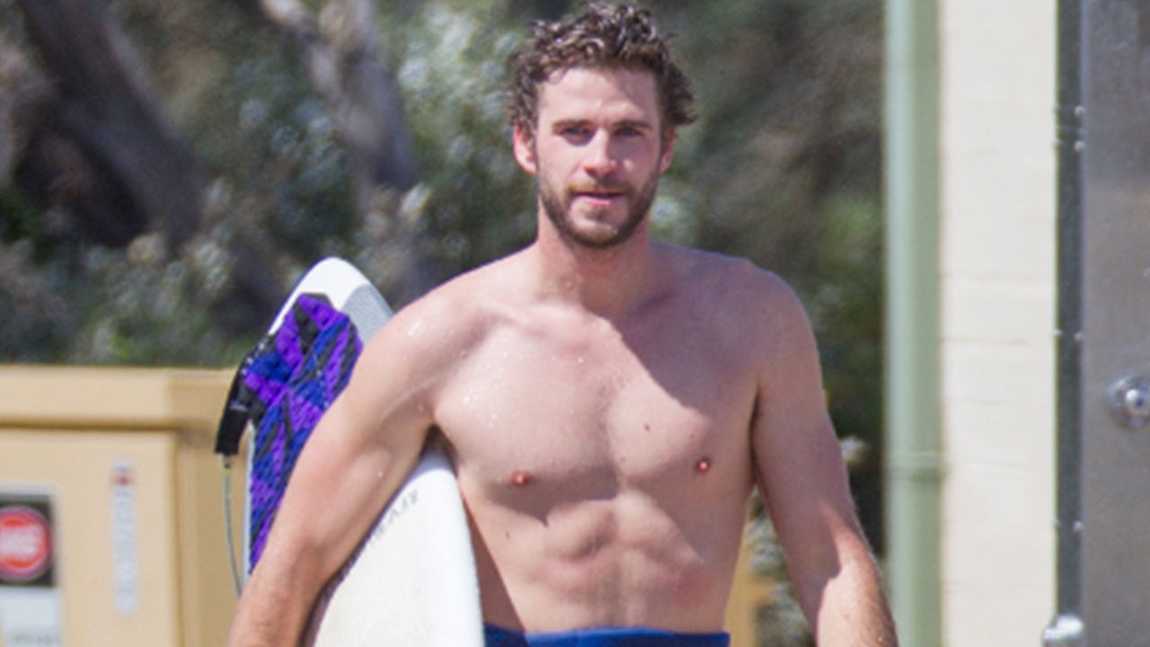Liam Hemsworth shows off his killer abs. 