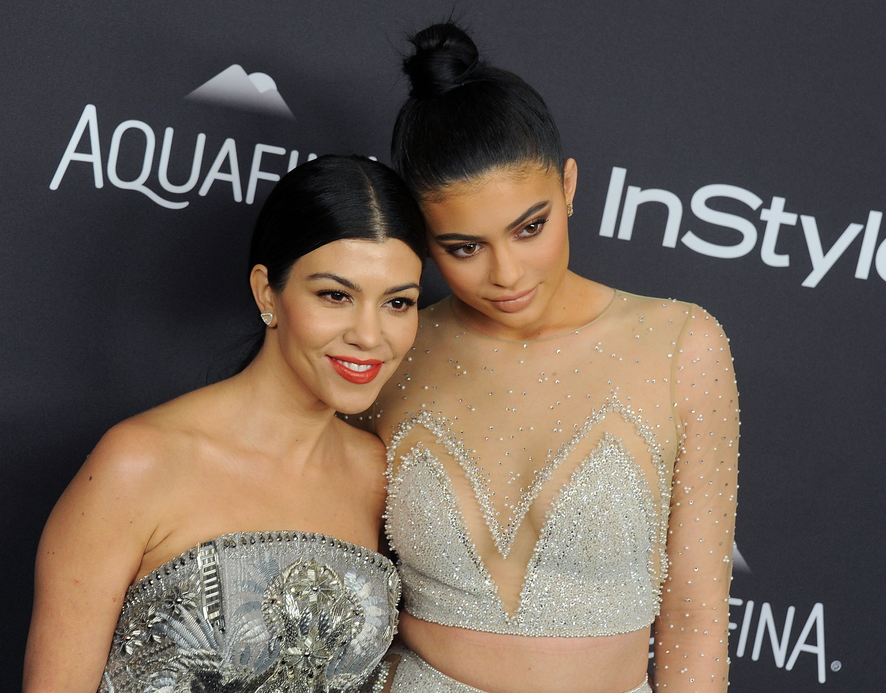 Kylie Jenner flaunts taut tummy with her BFF Jordyn Woods in LAas  'hubby' Travis Scott is in NYC