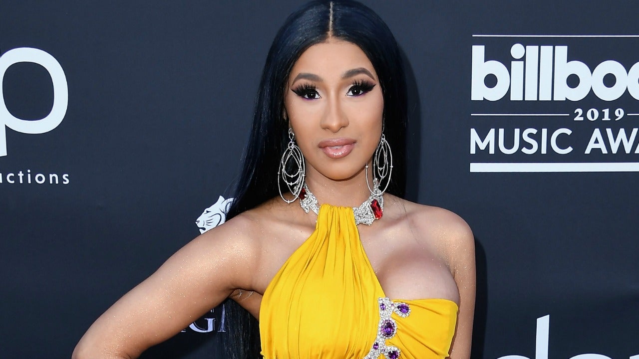 Cardi B Shows Off Her Toned Abs In Sexy Yellow Two Piece At 2019 Billboard Music Awards Entertainment Tonight - cardi b roblox id code song yellow