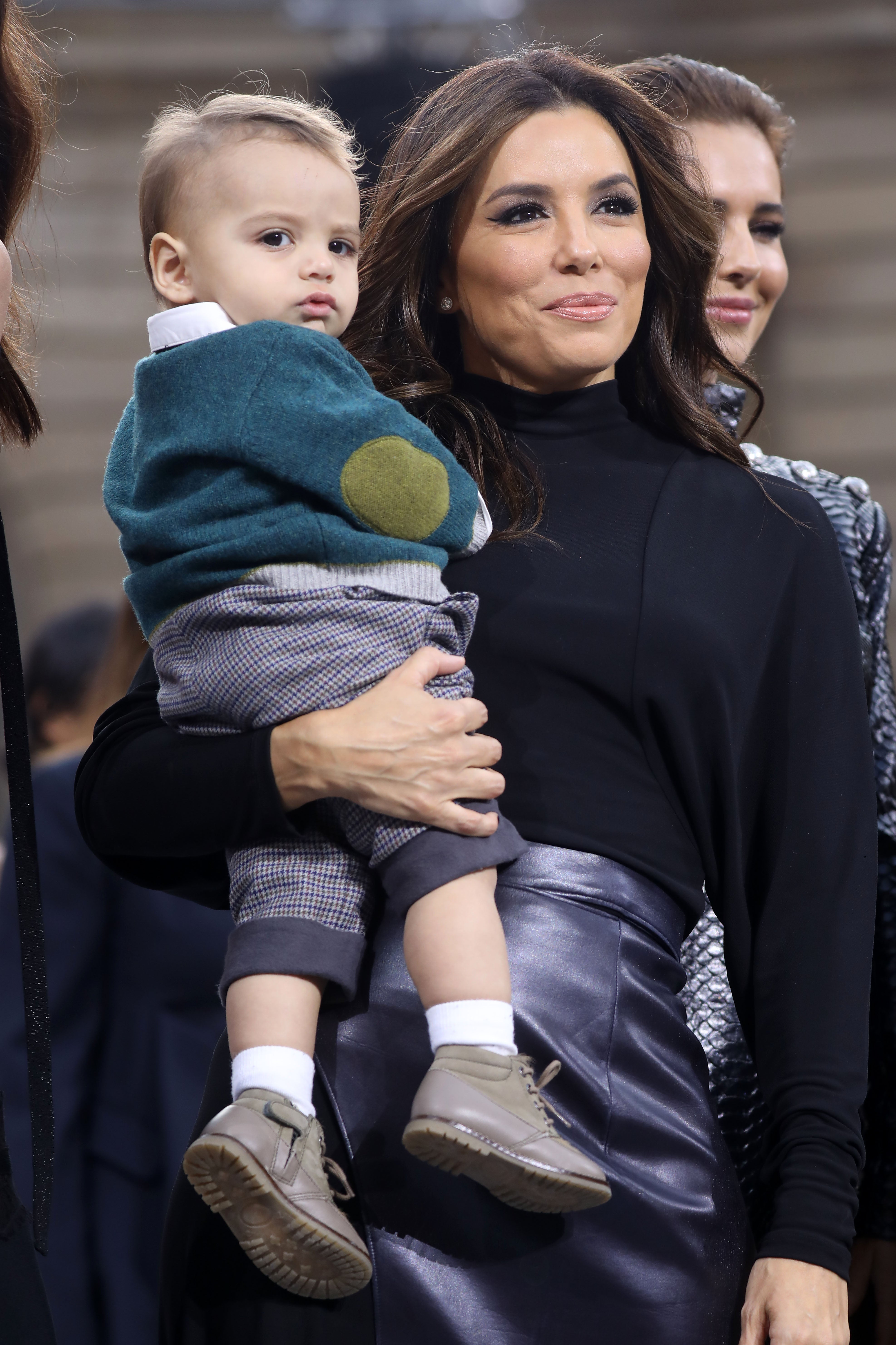 Eva Longoria S Son Santiago Is The Center Of Attention At Paris Fashion Week Show Pics Entertainment Tonight